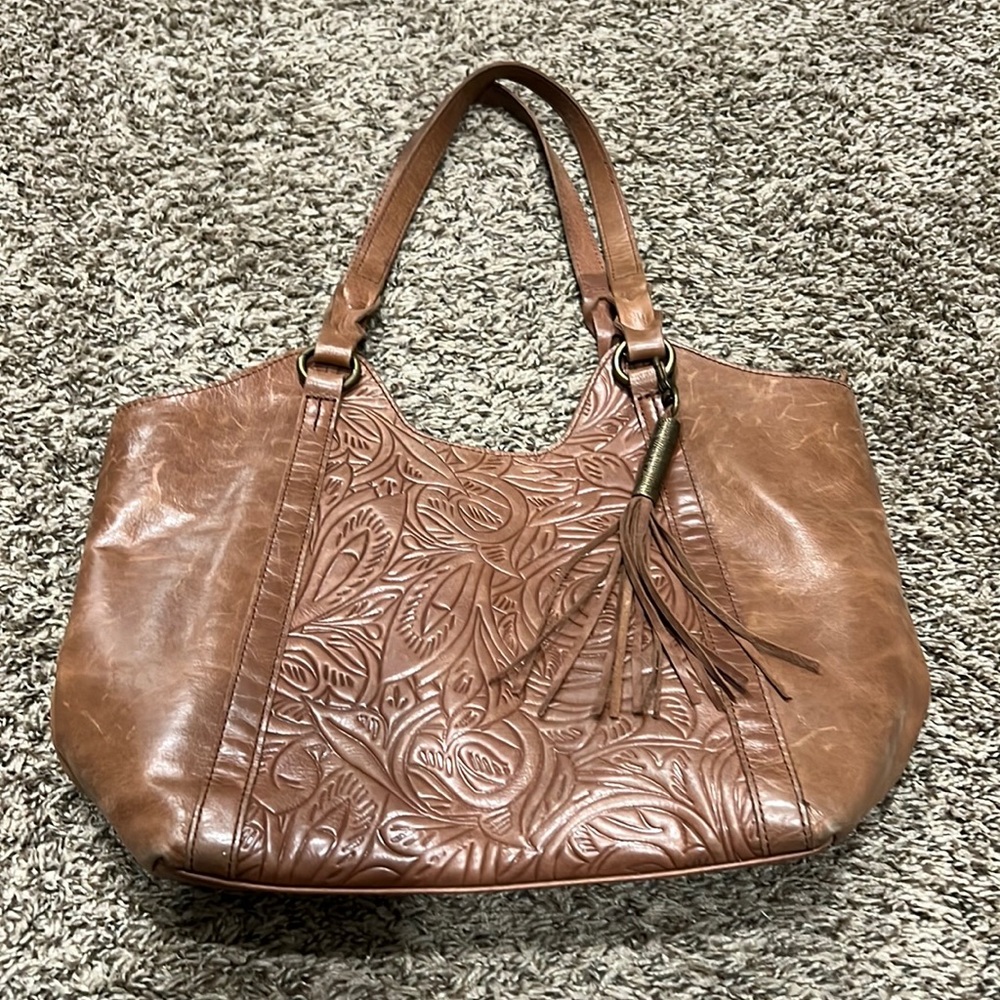 The sack leather purse, excellent condition many compartments, zippered pockets